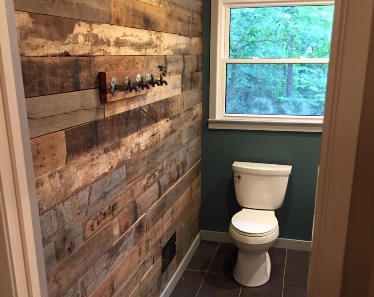 Barnwood wall in bathroom